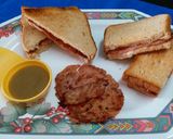 A picture of step 4 of Toasted Chicken Smoked Ham Sandwich.