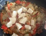 Foto del paso 5 de la receta: Calabacines rellenos de pimientos y queso