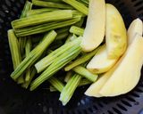 A picture of step 1 of Chhuin aloo tarkari (Drumstick curry).