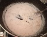 A picture of step 7 of Bhat karela pur with white sauce.