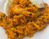 A picture of step 7 of Delicious Mixed Paella with Chicken, Shrimp, and Mushrooms.