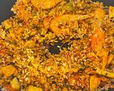 A picture of step 4 of Delicious Mixed Paella with Chicken, Shrimp, and Mushrooms.
