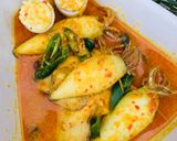 Foto langkah ke 7 dari resep Gulai Cumi Isi Tahu.