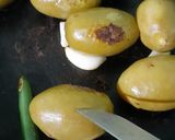A picture of step 3 of Amra(Hog Plum) Bharta.