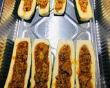 A picture of step 8 of Zucchini Boats 🚣‍♀️.