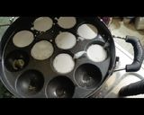 A picture of step 2 of Dudh Chitoi Pitha.