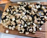 Une image de l'étape 3 de Poulet mariné aux aubergines et parmesan.