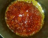 A picture of step 13 of Moi-moi with pepper and spring onion sauce.