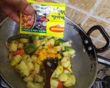 A picture of step 4 of Stir Fried Aloo Mirchi.