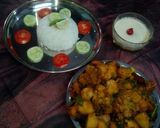 A picture of step 23 of Aloo fulcopi katla rosha ar misti doi.