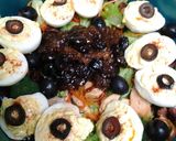 A picture of step 12 of Buttery broccoli salad topped with deviled eggs.