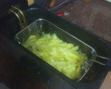 Foto del paso 2 de la receta: Muslitos de pollo al ajillo al horno con papas fritas