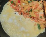 A picture of step 3 of Veggies and egg stir fry.