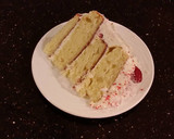 A picture of step 27 of Vanilla Lemon Raspberry Layer Cake with Whipped Cream Buttercream Frosting.