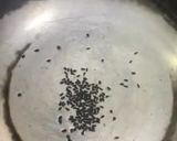 A picture of step 2 of Turaii (Ridge gourd) with kalonji and curry leaf.