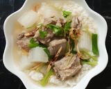 รูปขั้นตอนการทำที่ 2 ของ "ข้าวต้มไชเท้ากระดูกหมูซุปปลาหมึกแห้ง"🥣😋