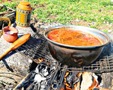 صورة لخطوة 3 من وصفة برغل على بندورة بالقاورما على الحطب