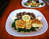 Foto del paso 7 de la receta: Merlucitas con setas salteadas al ajillo