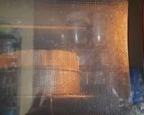 A picture of step 9 of Alphonso mango sooji dry fruits cake.