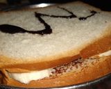 A picture of step 4 of PBC peanut,banana, chocolate SANDWICH.