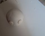A picture of step 14 of Halloween themed Chocolate cake (pops).