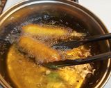 A picture of step 3 of Hand Dipped Corndogs.