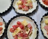 Foto del paso 5 de la receta: Tarteletas con tomate, huevo, jamón y queso