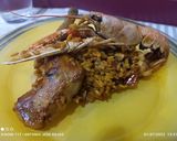 Foto del paso 5 de la receta: Arroz con manitas de conejo, cigalas, sepia y langostinos