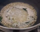 A picture of step 1 of Multigrain flour khichu.