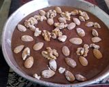 A picture of step 3 of Eggless chocolate Walnut almond cake.