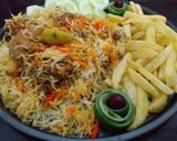A picture of step 12 of Smoked Biryani 😋🐓🍚.