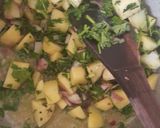A picture of step 5 of Coconut green peas with potatoes.