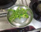 A picture of step 2 of Paneer corn capsicums in white greavy.