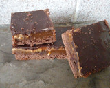 Foto del paso 4 de la receta: 『 Torta bombón 🍫 tarta de dulce de leche y chocolate 』