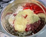 Une image de l'étape 12 de Courgettes et poivrons farcis bœuf, tomates et oignon.