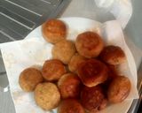 A picture of step 7 of Bread Meatballs in Tomato Sauce.