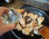 Foto del paso 3 de la receta: Alitas y muslitos al ajillo