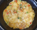 Foto del paso 3 de la receta: Tortilla de patata, cebolla, pimiento rojo y verde