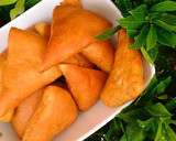A picture of step 7 of Triangle shaped stuffed bread.