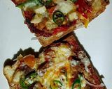 A picture of step 5 of Chicken tikka bread pizza 😋👍.