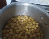A picture of step 1 of Chole ragda with potato pattice.