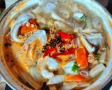 A picture of step 5 of Tom Yum Soup with Mushrooms and Shrimp.