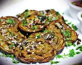 A picture of step 7 of Patra Bhajiya(colocasia leaves fritters).