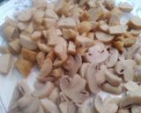 A picture of step 2 of Cream of mushrooms and sausages soup.