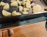 Foto del paso 2 de la receta Alitas al horno con patatas y cebolla
