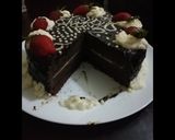 A picture of step 11 of Chocolate cake with chocolate ganache and whipped cream icing.