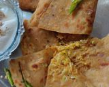 A picture of step 10 of Gobhi paratha with mitha Dahi.