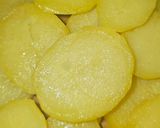 Foto del paso 5 de la receta Patatas confitadas al aroma de langostinos al ajillo