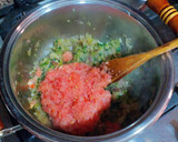 Foto del paso 9 de la receta: Calamares en su tinta con un toque de pasta de curry verde