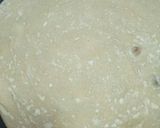 A picture of step 7 of Spicy lentils (kamande)in milk and cinnamon raisins chapati.